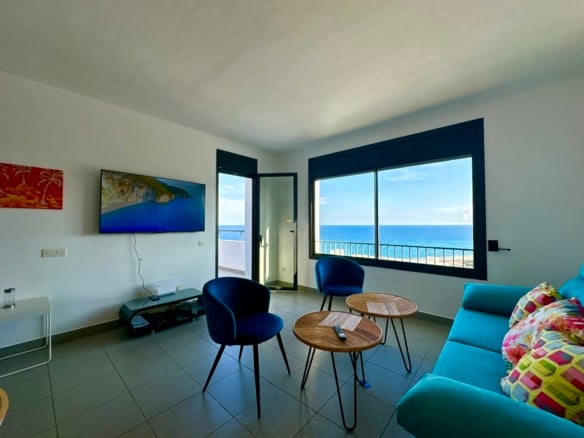 Luxury beachfront penthouse Mojacar sea view living room with terrace and panoramic Mediterranean views
