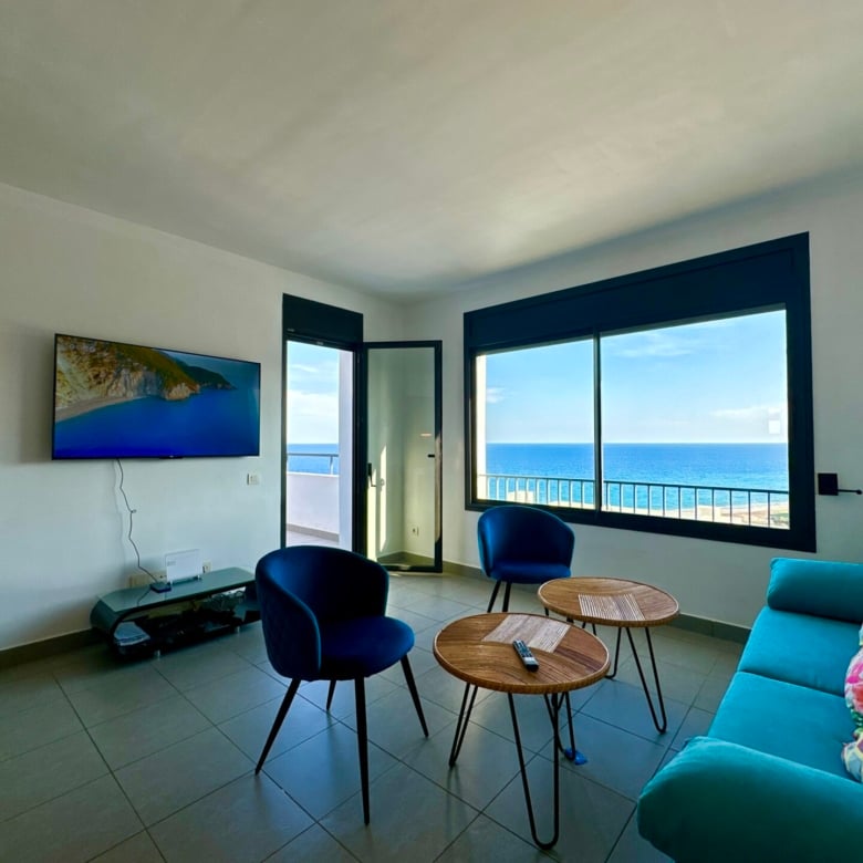Luxury beachfront penthouse Mojacar sea view living room with terrace and panoramic Mediterranean views