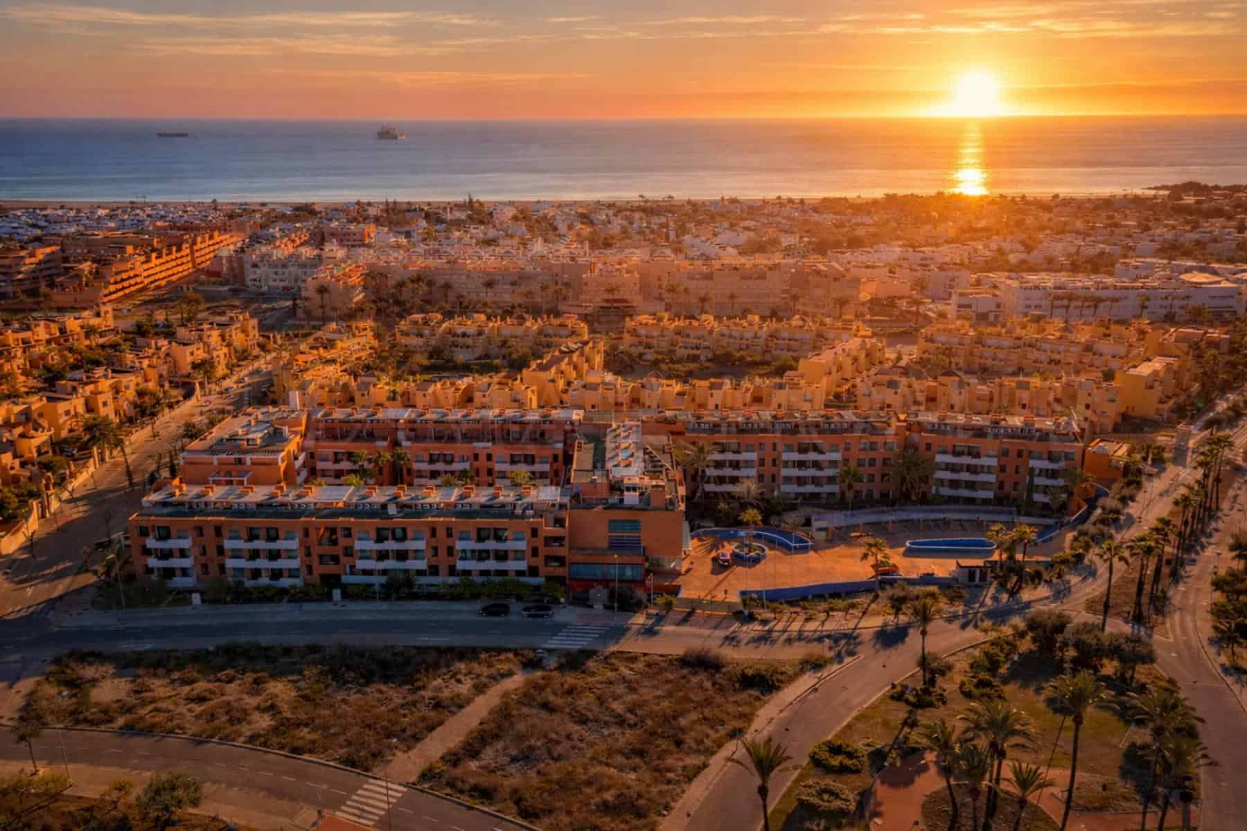 Mediterranean sunrise over coastal complex